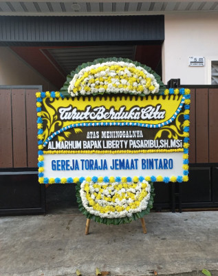 Papan Bunga Duka di Bangun Purba
